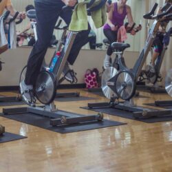 Group of people using stationary bikes during a class at Parkside Fitness