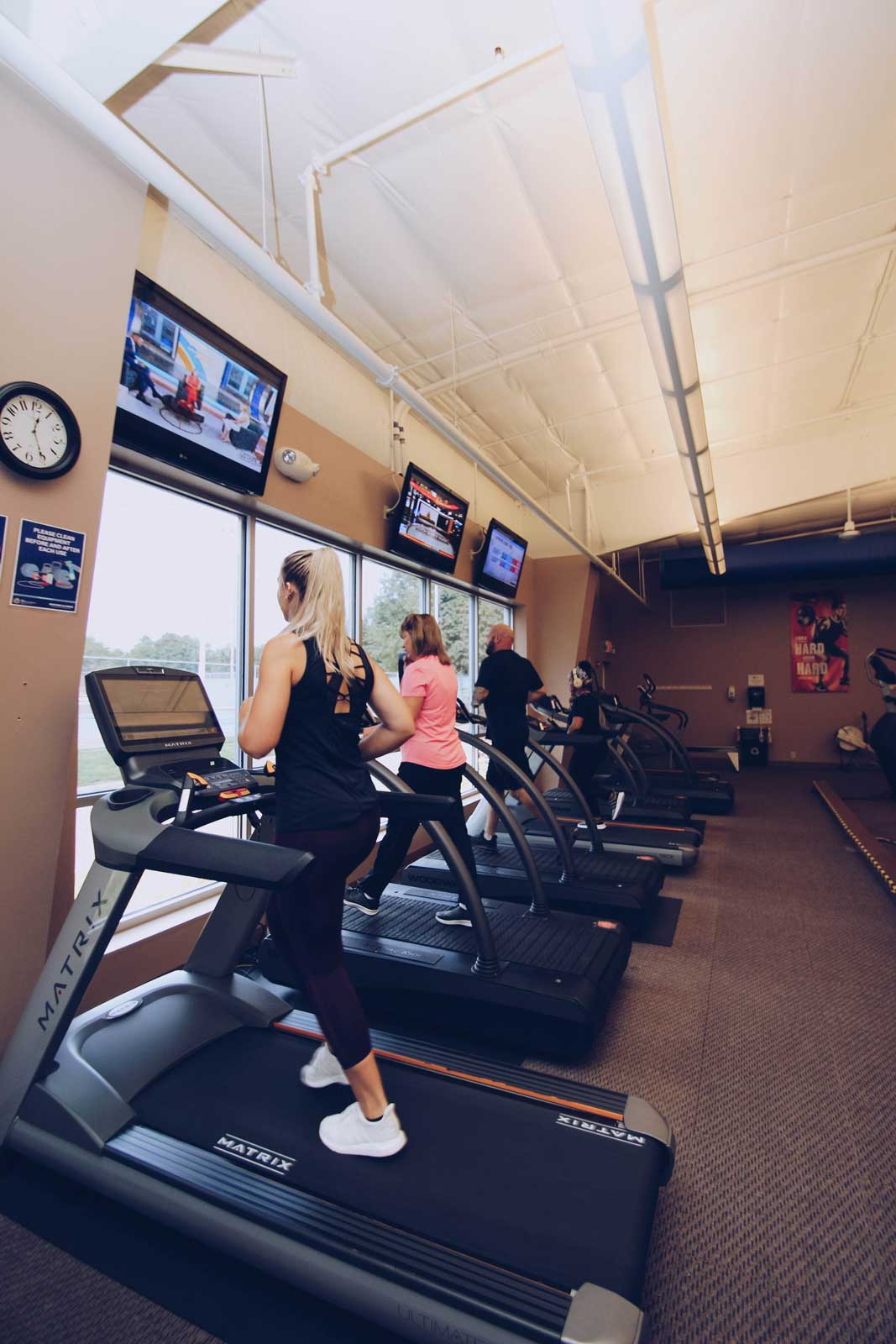 People running and walking on treadmills at Parkside Fitness