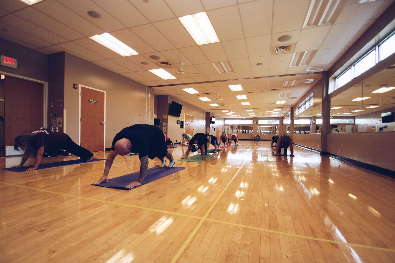 A group of people doing yoga at Parkside Fitness