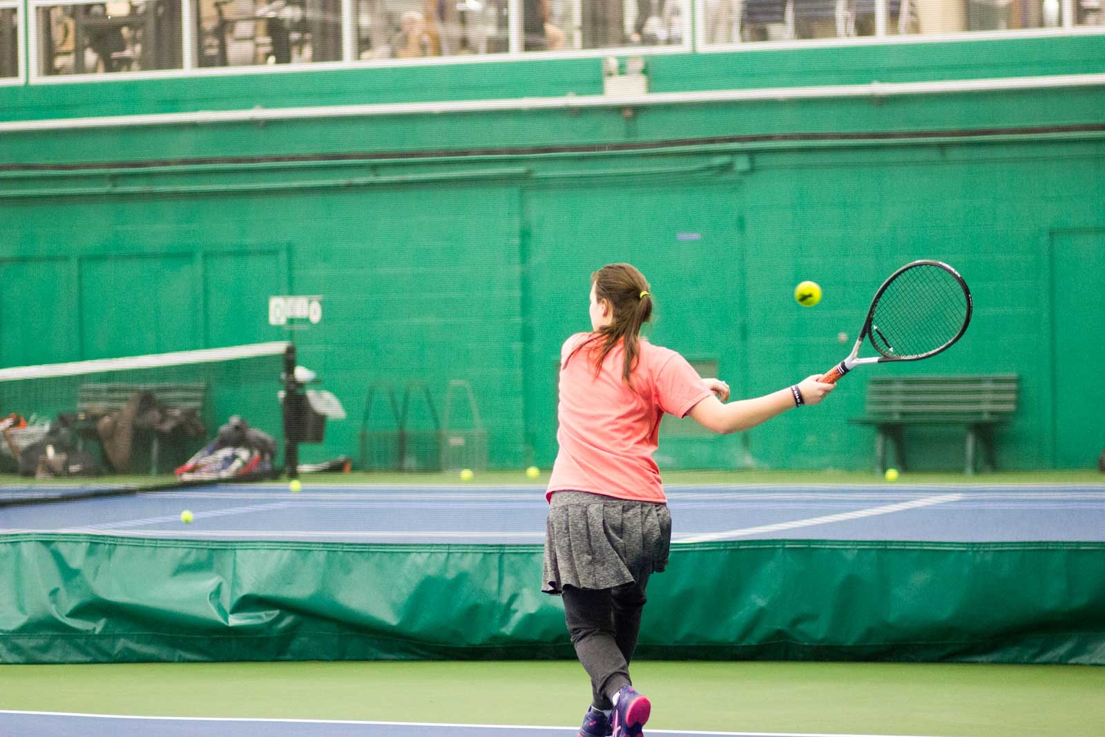 Woman playing tennis on the Pekin Park District tennis courts