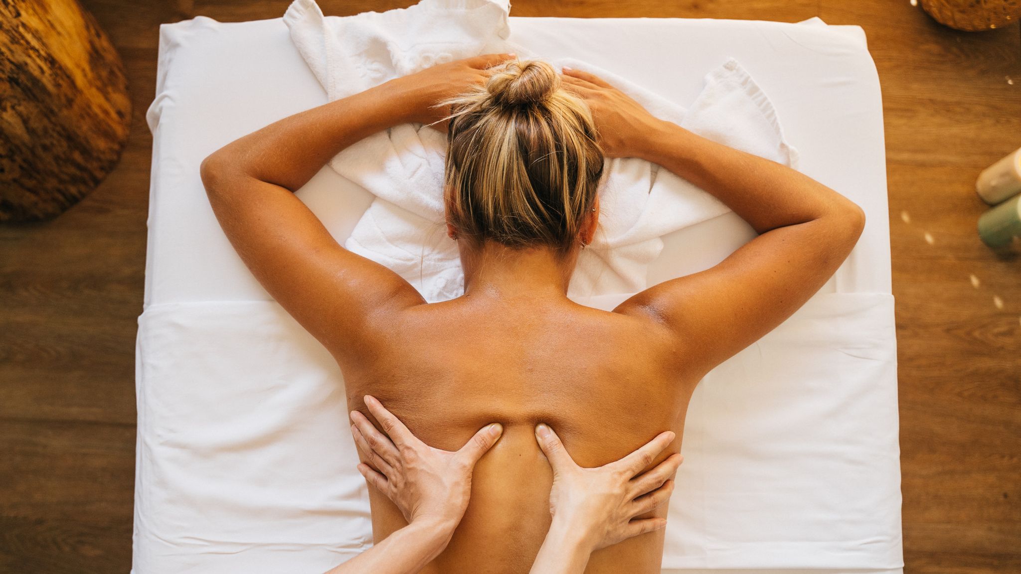 Blonde woman getting a back massage